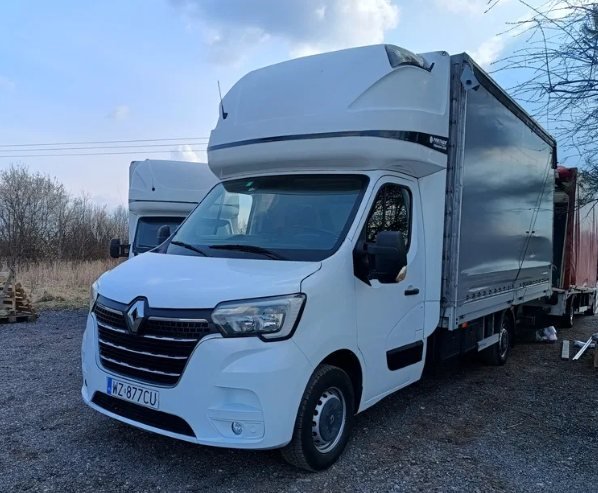 Renault Master z plandeką, firanką i windą załadowczą — wynajem Kielce